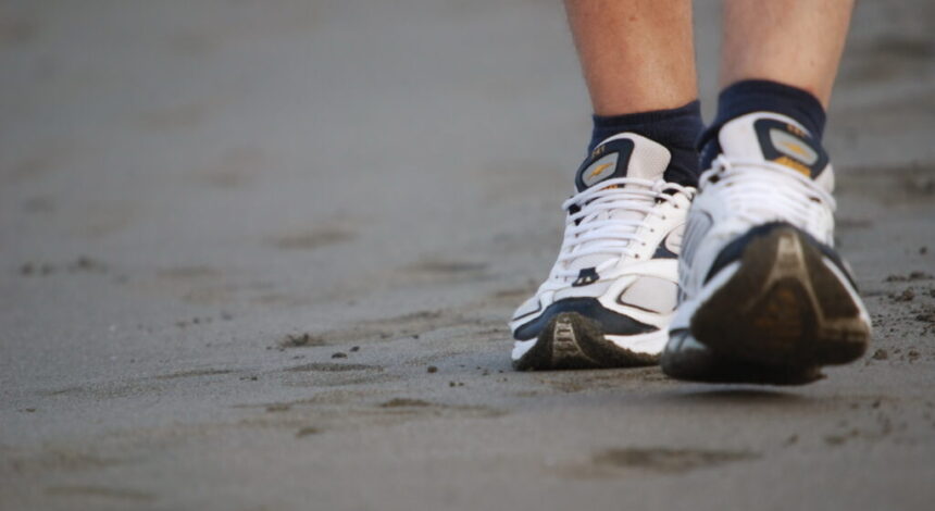 man walking on beach